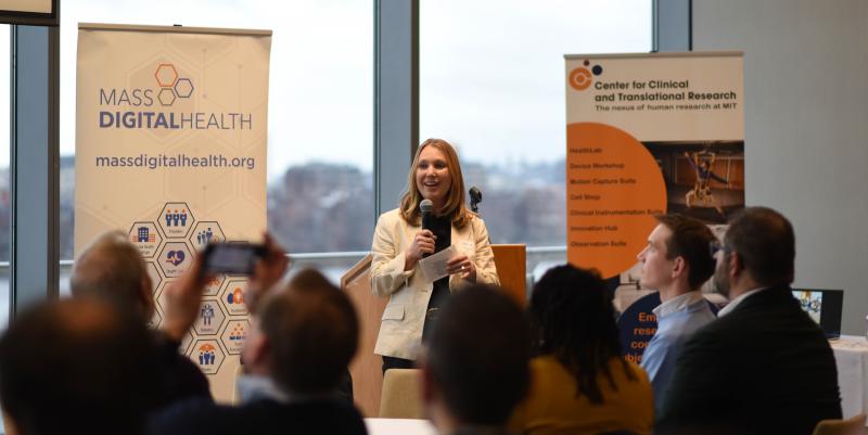 Keely Benson speaking in front of a group of people