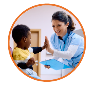 Primary Care doctor high-fiving young patient